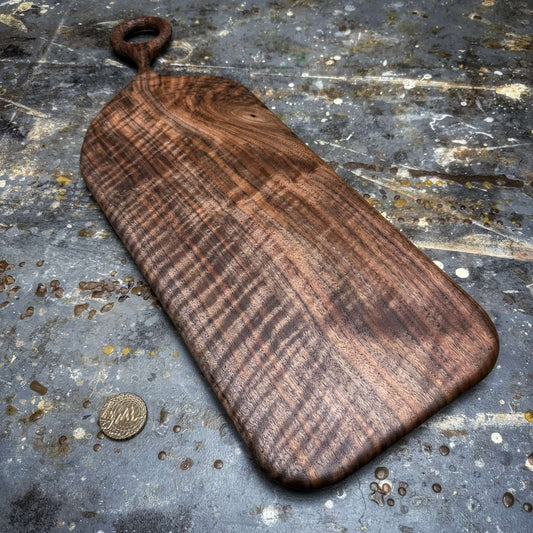 black walnut textured handle board with highly figured grain