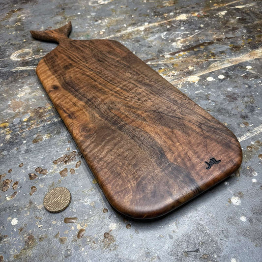 full board shot highlighting figure and handle design