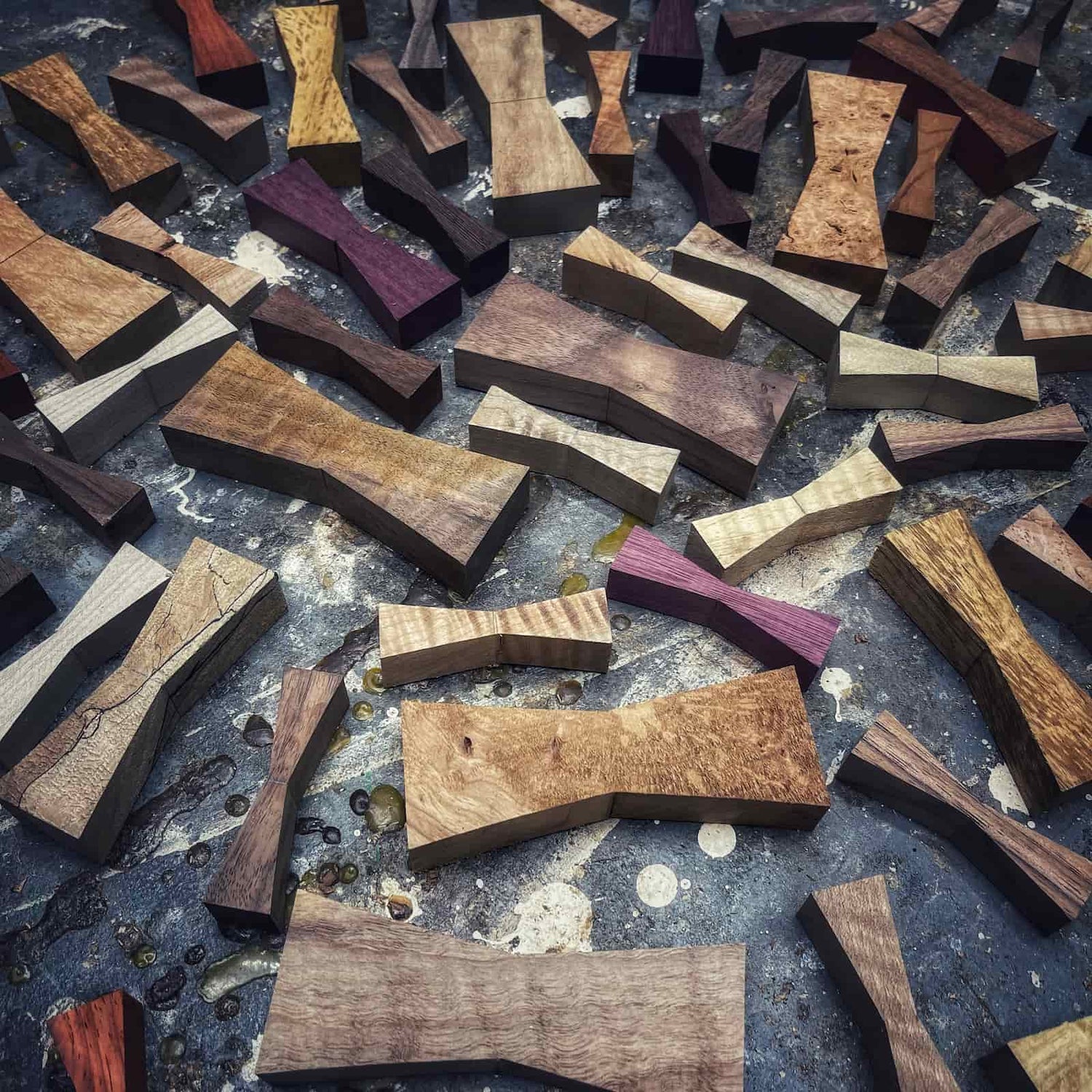 hand cut hardwood inlay collection with varied shapes, distinctive grain patterns, and clean crisp edges crafted by JML Woodcraft