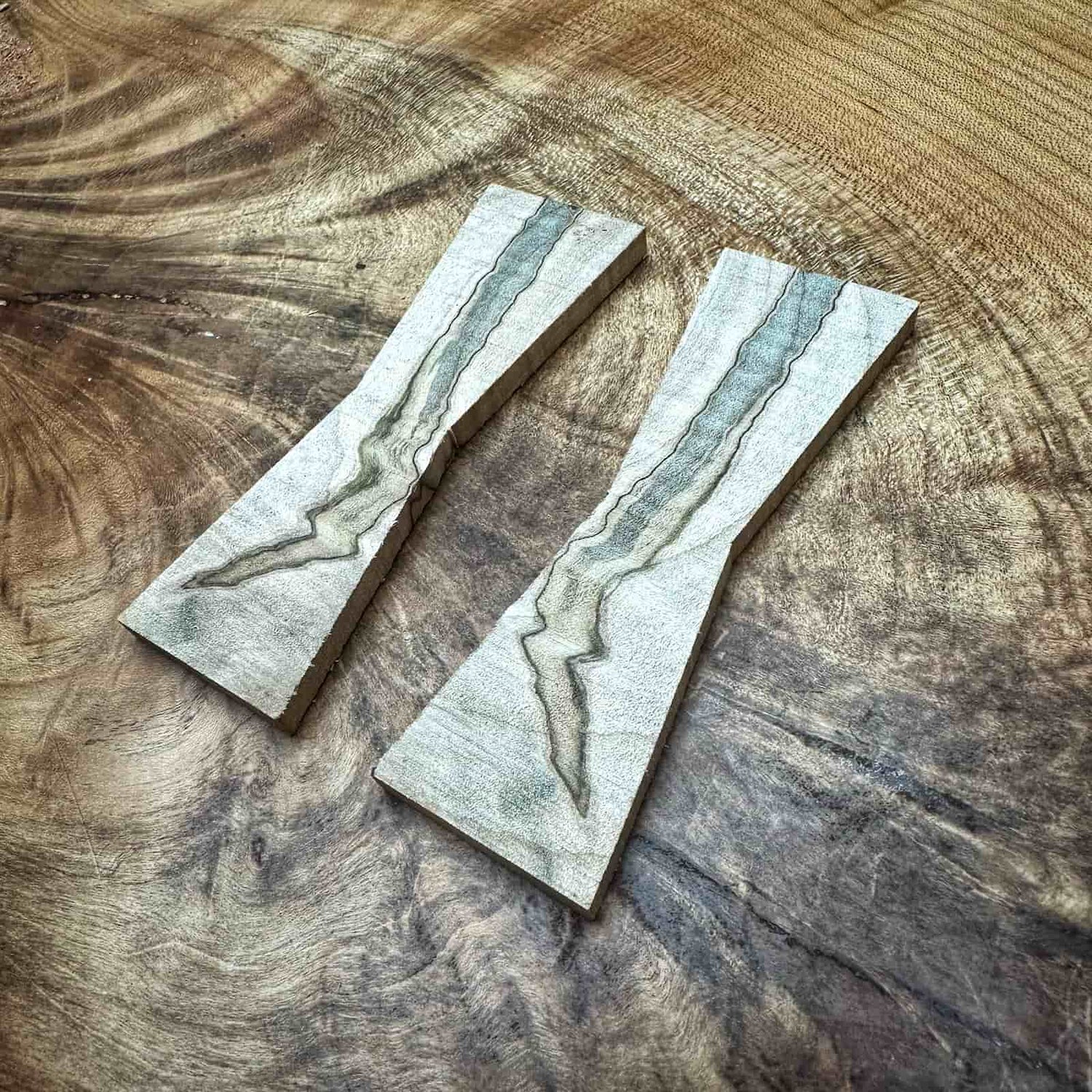 handcrafted hardwood panel showcasing mirrored figure, light natural tone, and clean decorative joinery accents created by JML Woodcraft