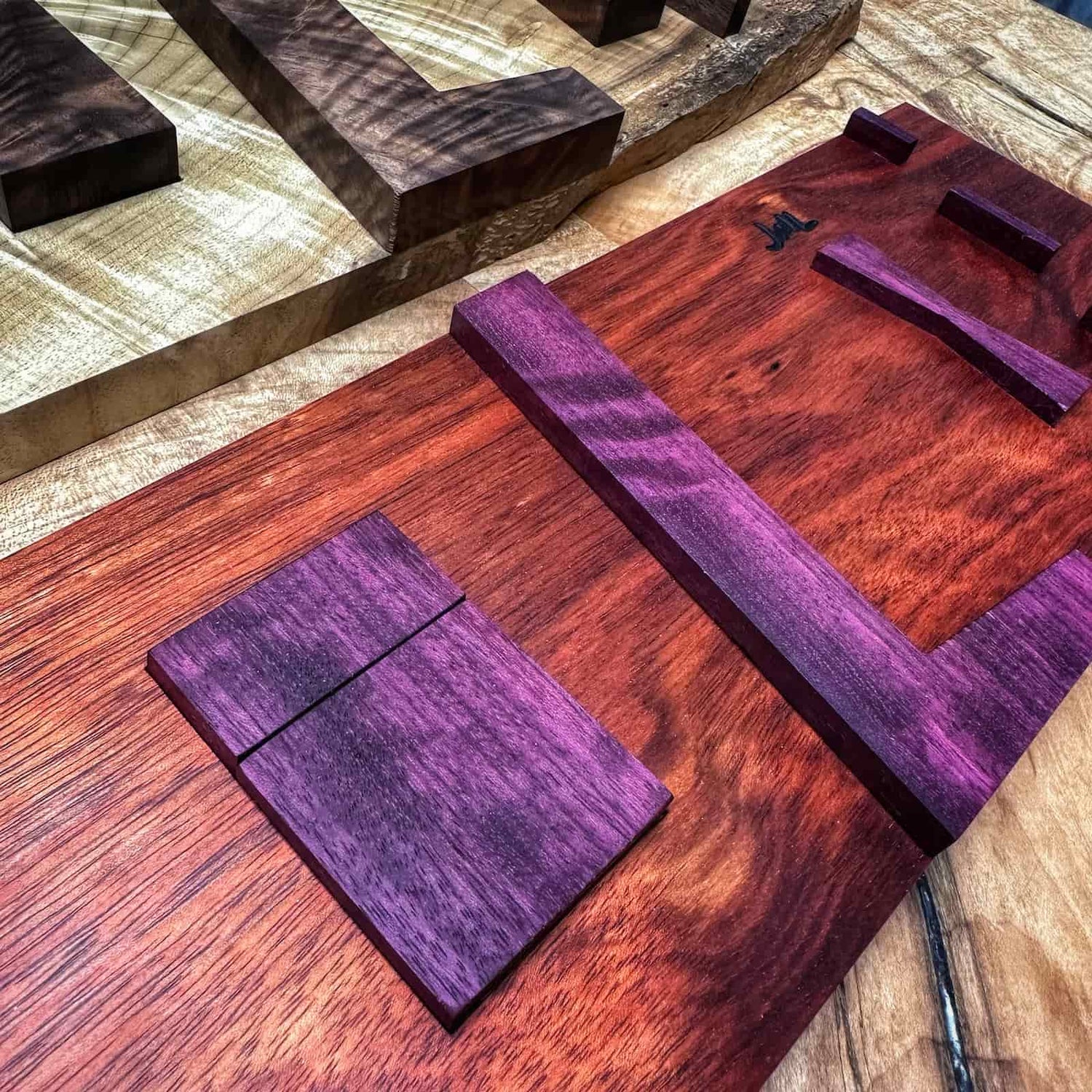 handcrafted hardwood inlay jig made from an uncommon species featuring rich natural detail, smooth refined shaping, and precise guide layout crafted by JML Woodcraft