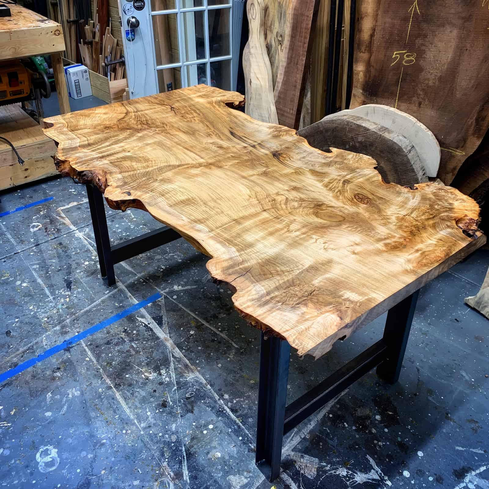 hand built hardwood desk featuring striking natural figure, bright clean tone, and a refined modern workspace design crafted by JML Woodcraft