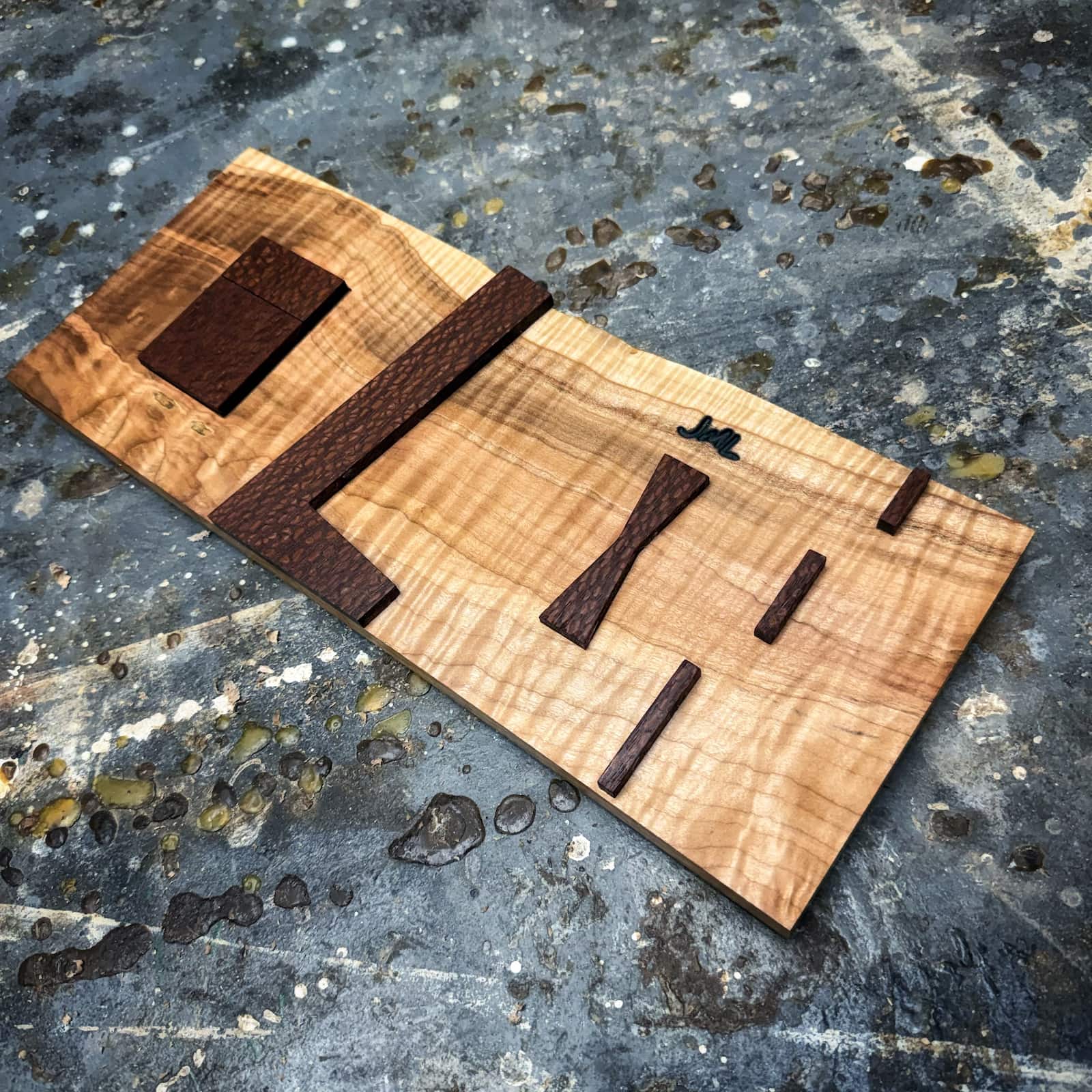 Bandsaw inlay jig with curly maple base and leopardwood top parts