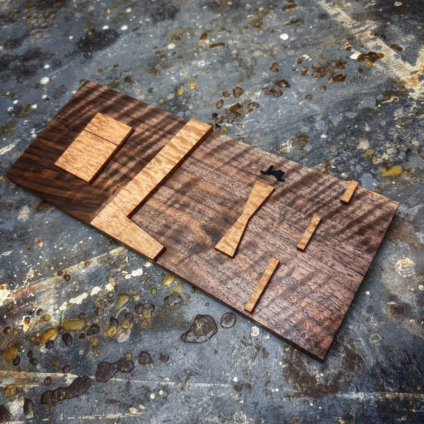 Curly walnut inlay jig with quilted maple components