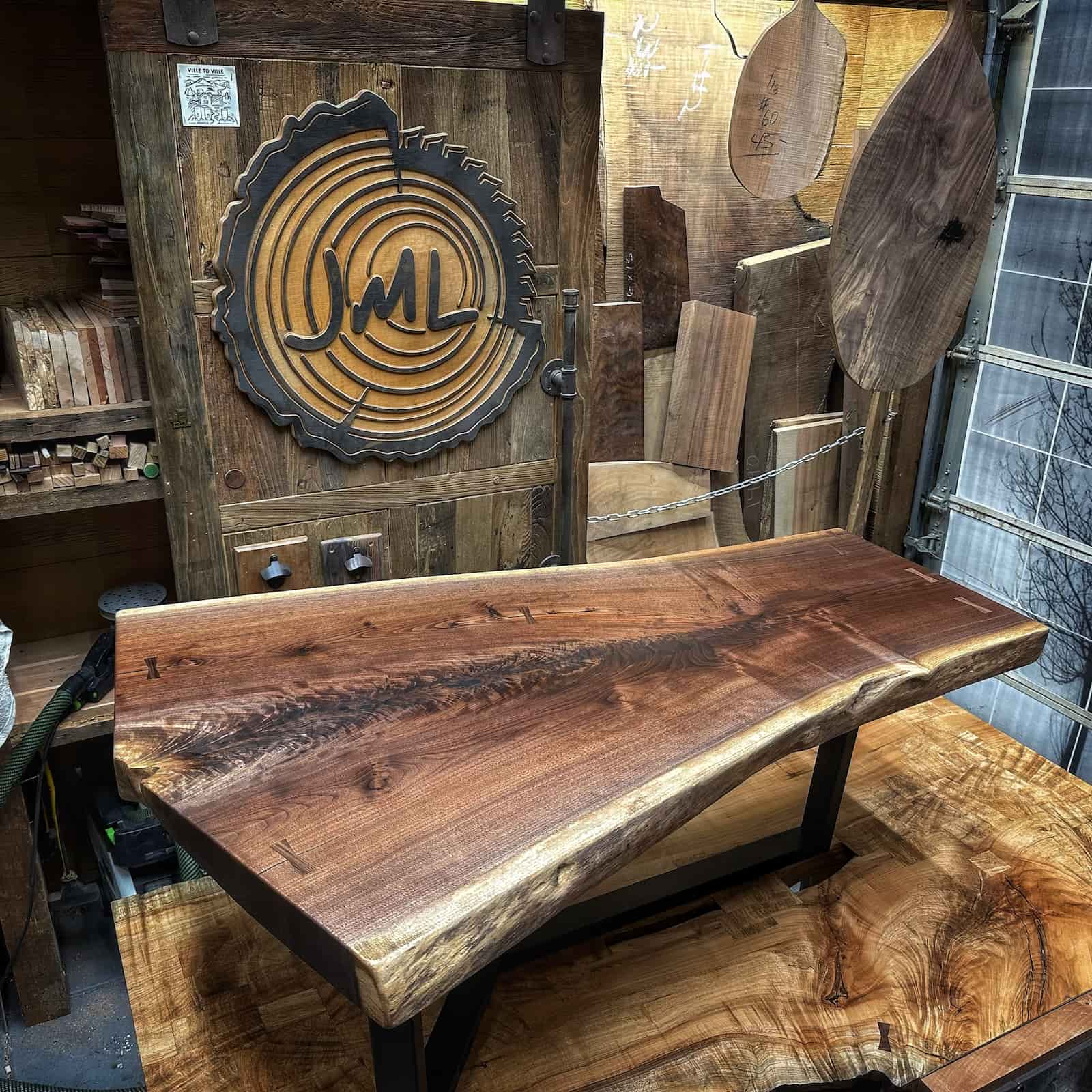 live edge walnut coffee table handcrafted with natural grain and polished finish by JML Woodcraft