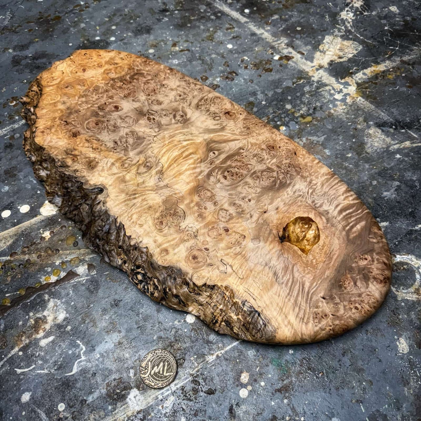 closeup of tight burl clusters and swirling maple grain
