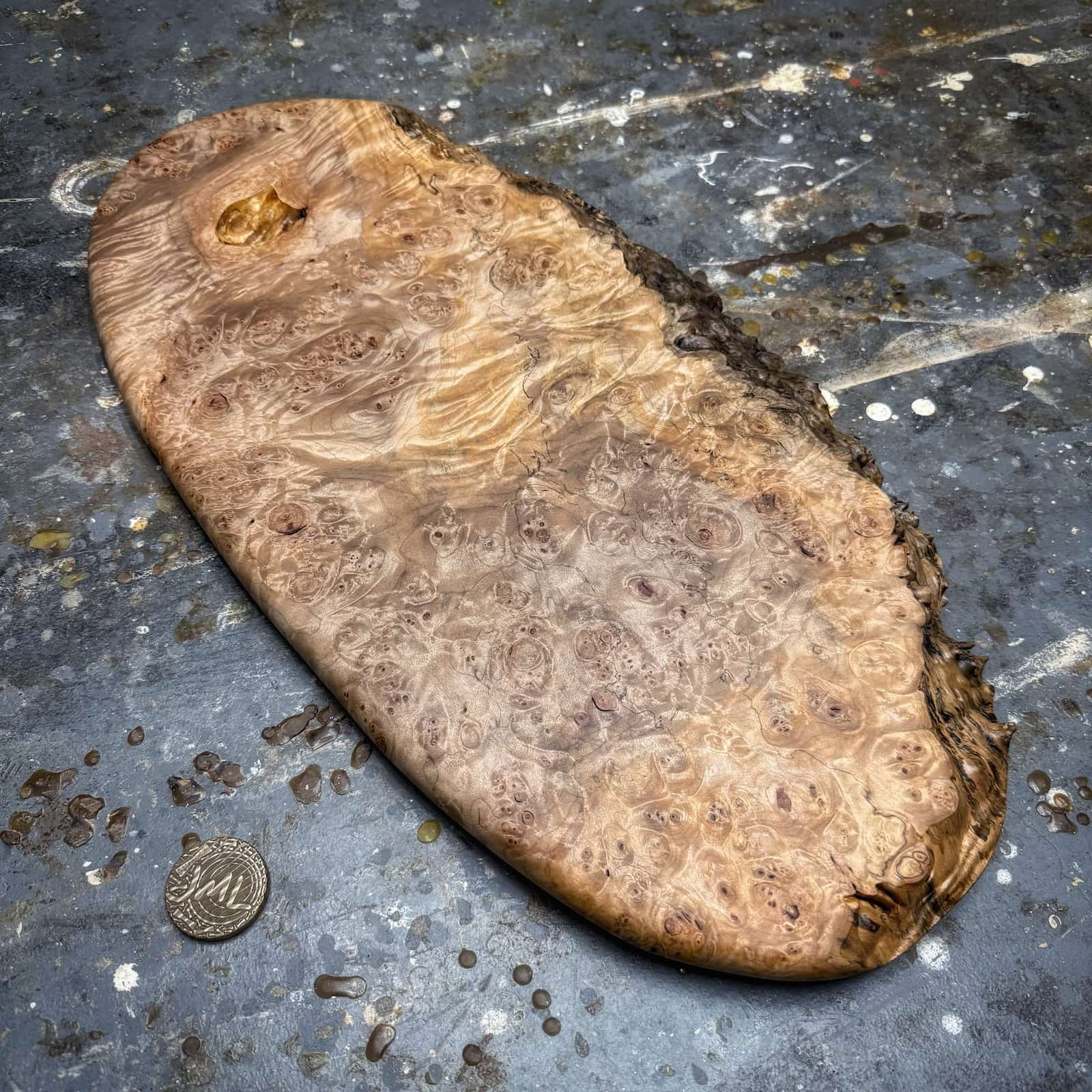 side profile showing board thickness and clean cut-through burl