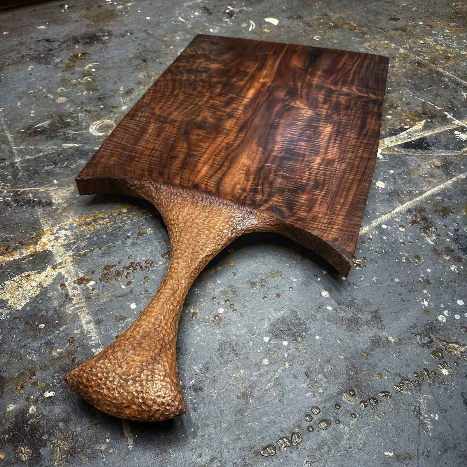 sculpted handle walnut serving board handcrafted with rich natural grain by JML Woodcraft