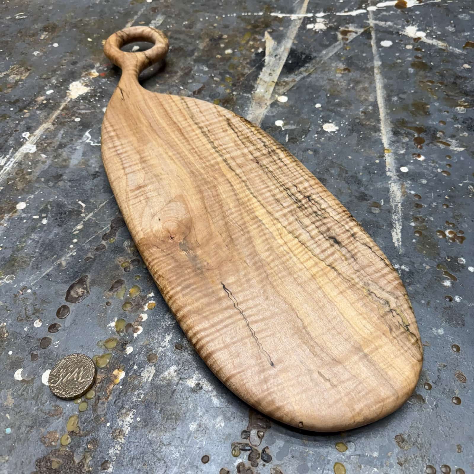 rear view of spalted curly ambrosia maple board with ring handle